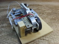 First motor with guide rails