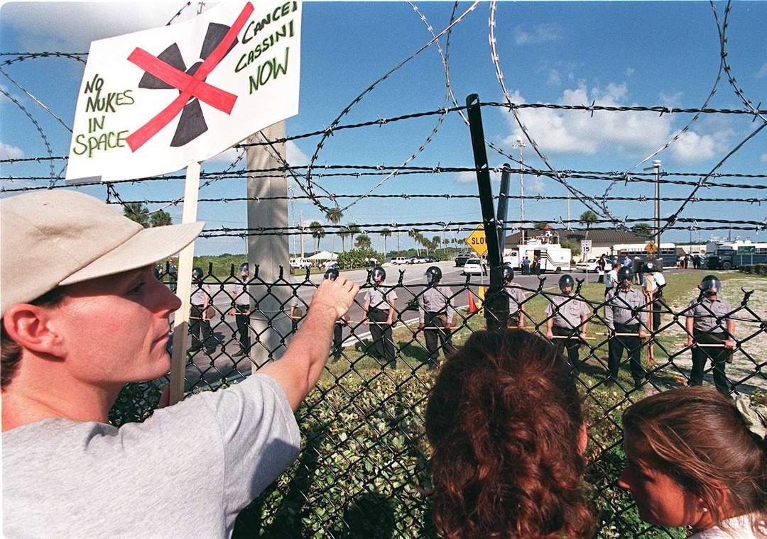 Protesters protesting against the launch of the Cassini-Huygens mission — they don't want to let the RTG go to space! They even went to court, but the lawsuit was (thankfully) dismissed. And it was only thirty-something kilograms of plutonium flying away. October 4, 1997, Cape Canaveral