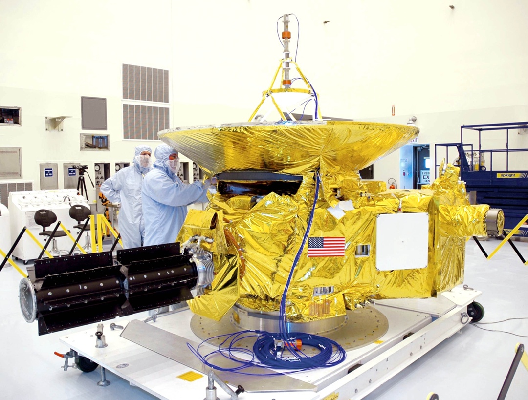 NASA staff attaching our beloved RTGs to the New Horizons probe