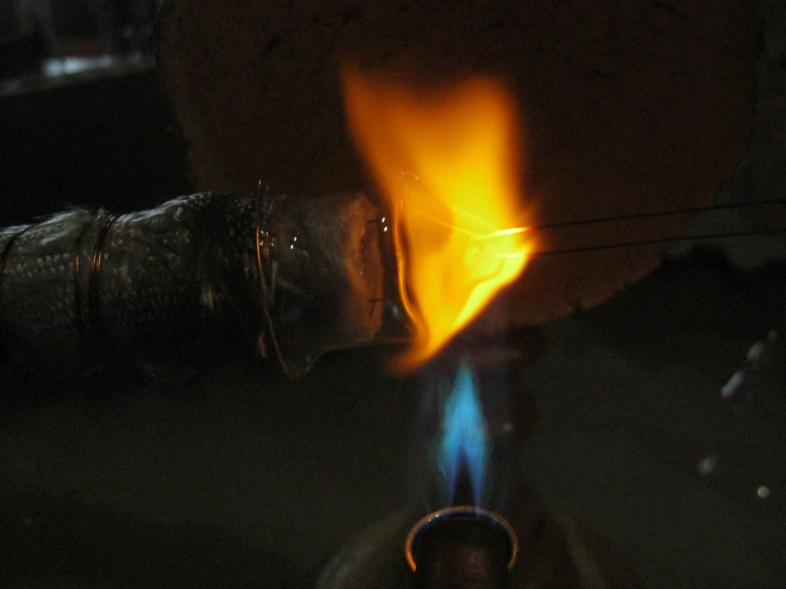 Getter with glass-coated platinite lead